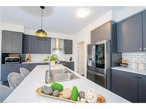 22 Oaktree Drive, Caledonia, ON - Indoor Photo Showing Kitchen With Stainless Steel Kitchen With Double Sink With Upgraded Kitchen