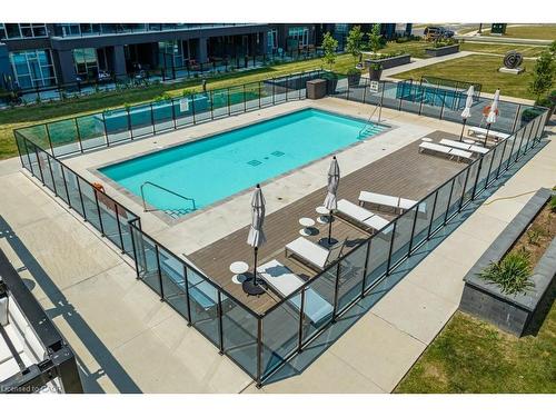 118-16 Concord Place, Grimsby, ON - Outdoor With In Ground Pool