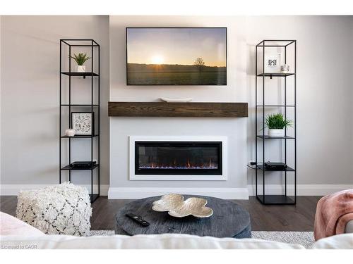 202 Bridge Crescent, Minto, ON - Indoor Photo Showing Living Room With Fireplace