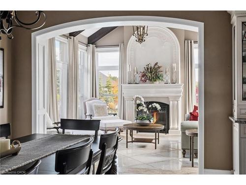 95 Old Ruby Lane, Puslinch, ON - Indoor Photo Showing Dining Room With Fireplace