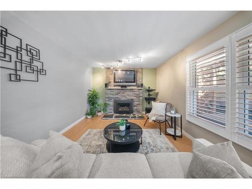 54 Pathfinder Crescent, Kitchener, ON - Indoor Photo Showing Living Room With Fireplace