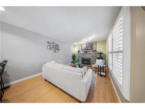 54 Pathfinder Crescent, Kitchener, ON - Indoor Photo Showing Living Room With Fireplace