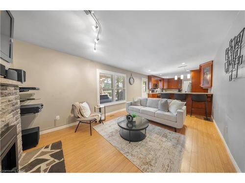 54 Pathfinder Crescent, Kitchener, ON - Indoor Photo Showing Living Room With Fireplace