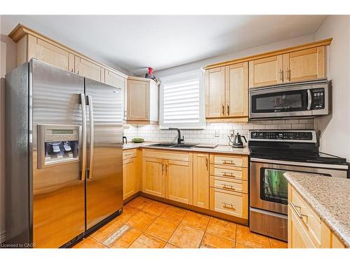 31 Buchanan Street, Hamilton, ON - Indoor Photo Showing Kitchen With Stainless Steel Kitchen With Double Sink