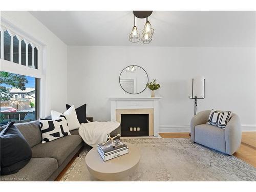 13 Bruce Street, Hamilton, ON - Indoor Photo Showing Living Room With Fireplace