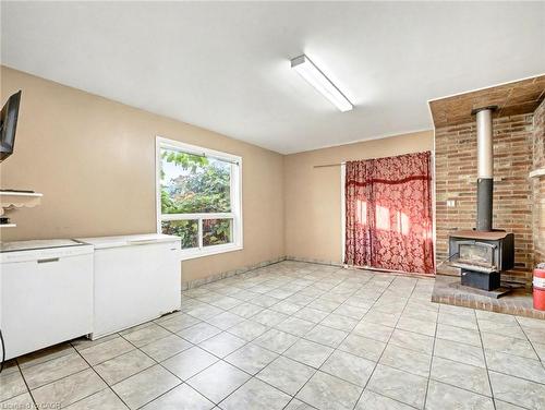 23 Oak Avenue, Hamilton, ON - Indoor Photo Showing Other Room With Fireplace