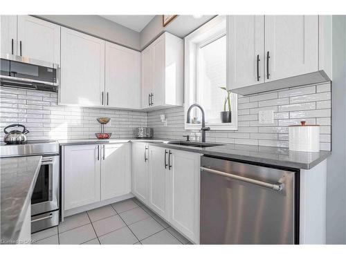 253 Kinsman Drive, Binbrook, ON - Indoor Photo Showing Kitchen With Double Sink With Upgraded Kitchen
