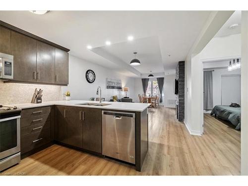 102-70 Stewart Street, Oakville, ON - Indoor Photo Showing Kitchen With Double Sink With Upgraded Kitchen