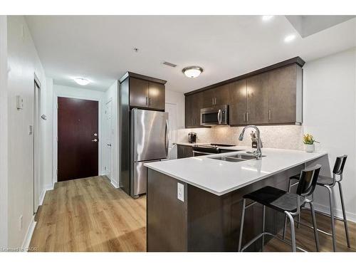 102-70 Stewart Street, Oakville, ON - Indoor Photo Showing Kitchen With Double Sink With Upgraded Kitchen