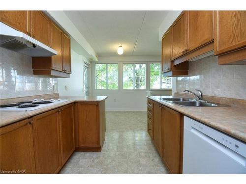 102-600 Silverbirch Boulevard, Hamilton, ON - Indoor Photo Showing Kitchen With Double Sink