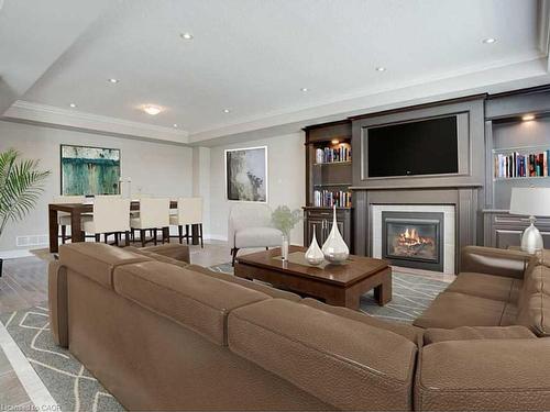 Upper-16 Riva Court, Hamilton, ON - Indoor Photo Showing Living Room With Fireplace