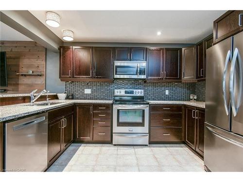 105 Captain Mccallum Drive, New Hamburg, ON - Indoor Photo Showing Kitchen With Double Sink