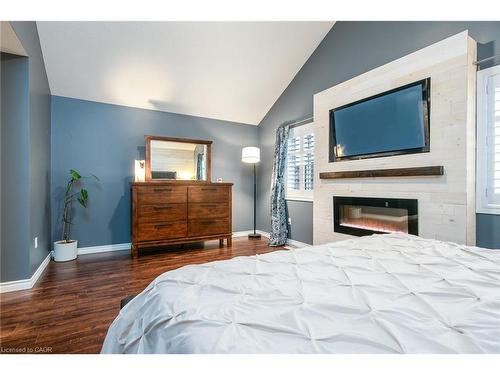 105 Captain Mccallum Drive, New Hamburg, ON - Indoor Photo Showing Bedroom With Fireplace