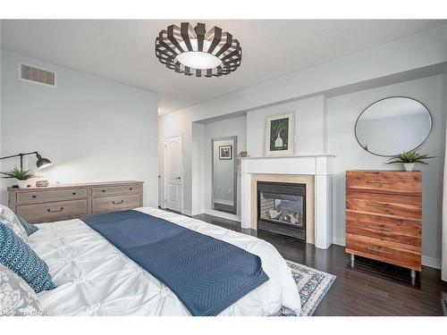 3327 Skipton Lane, Oakville, ON - Indoor Photo Showing Bedroom With Fireplace