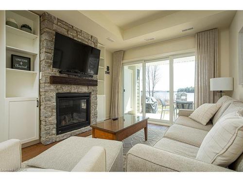 Btv-105-1869 Muskoka 118 Road W, Bracebridge, ON - Indoor Photo Showing Living Room With Fireplace