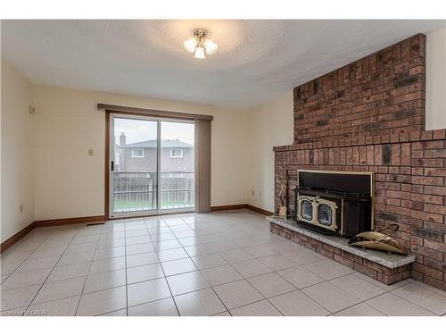 18 Marcel Place, Hamilton, ON - Indoor Photo Showing Living Room With Fireplace