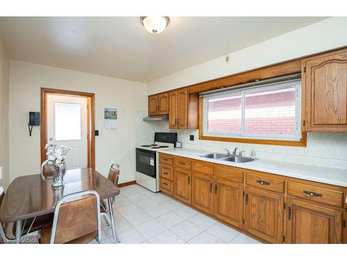 313 Barton Street W, Hamilton, ON - Indoor Photo Showing Kitchen With Double Sink