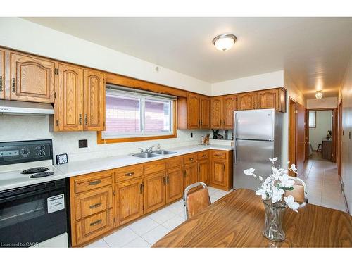 313 Barton Street W, Hamilton, ON - Indoor Photo Showing Kitchen With Double Sink