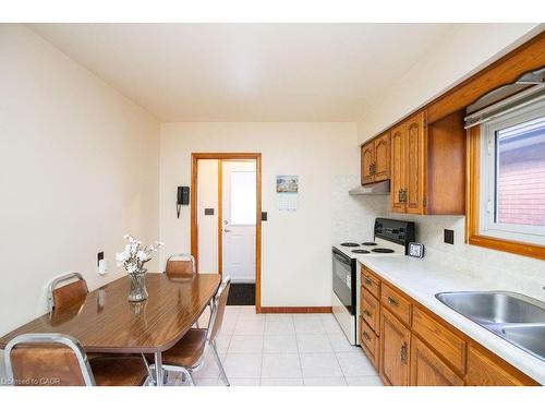 313 Barton Street W, Hamilton, ON - Indoor Photo Showing Kitchen With Double Sink