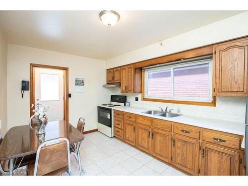 313 Barton Street W, Hamilton, ON - Indoor Photo Showing Kitchen With Double Sink