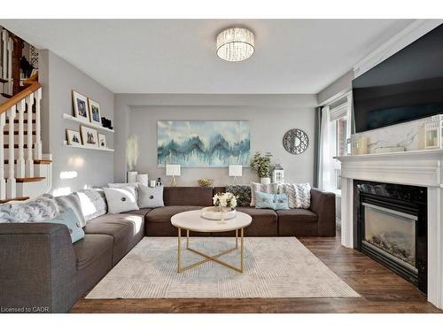 4 Swift Crescent, Cambridge, ON - Indoor Photo Showing Living Room With Fireplace