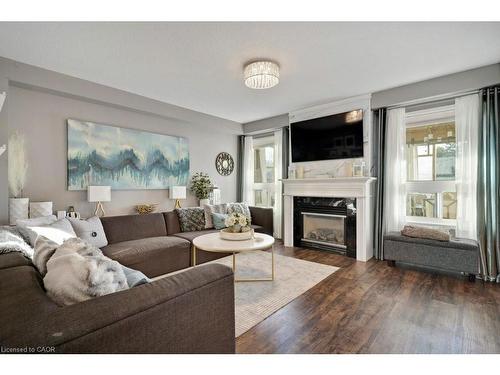 4 Swift Crescent, Cambridge, ON - Indoor Photo Showing Living Room With Fireplace