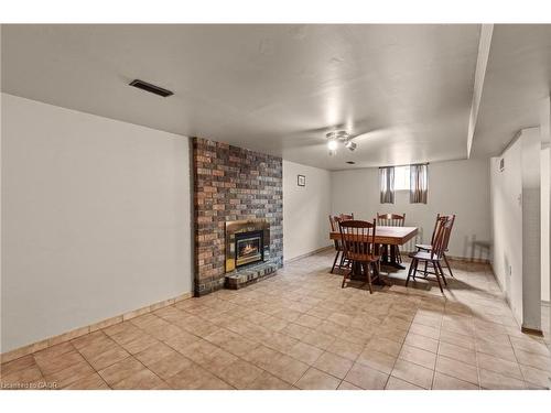 477 East 38Th Street, Hamilton, ON - Indoor Photo Showing Dining Room With Fireplace