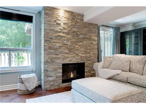19-2151 Walkers Line, Burlington, ON - Indoor Photo Showing Living Room With Fireplace