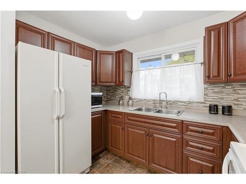 28 Bacall Crescent, Hamilton, ON - Indoor Photo Showing Kitchen With Double Sink