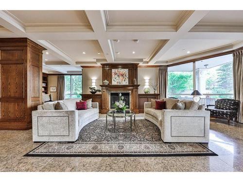 807-1900 The Collegeway, Mississauga, ON - Indoor Photo Showing Living Room With Fireplace