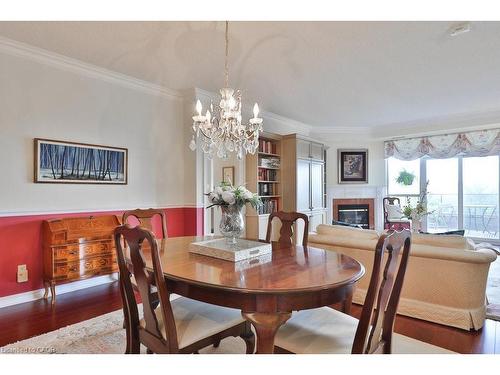 807-1900 The Collegeway, Mississauga, ON - Indoor Photo Showing Dining Room With Fireplace