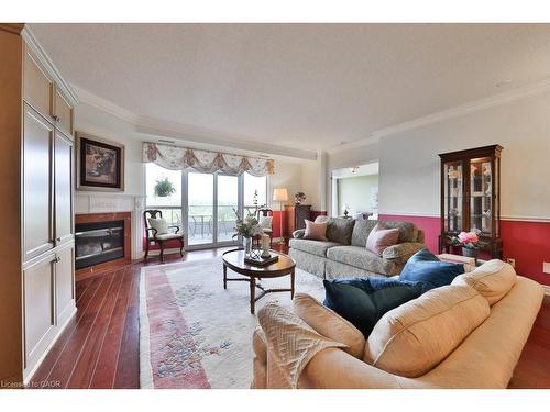 807-1900 The Collegeway, Mississauga, ON - Indoor Photo Showing Living Room With Fireplace