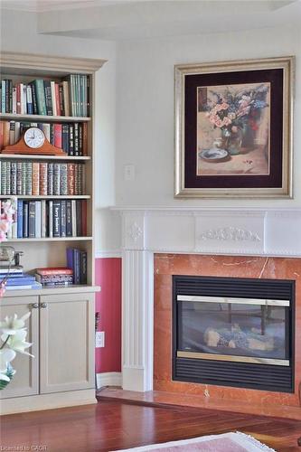 807-1900 The Collegeway, Mississauga, ON - Indoor Photo Showing Living Room With Fireplace