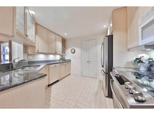 807-1900 The Collegeway, Mississauga, ON - Indoor Photo Showing Kitchen With Double Sink