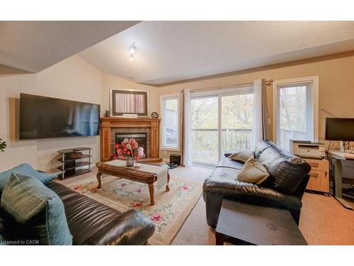 7-330 Dearborn Boulevard, Waterloo, ON - Indoor Photo Showing Living Room With Fireplace