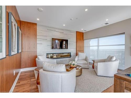 202-1878 Gordon Street, Guelph, ON - Indoor Photo Showing Living Room With Fireplace