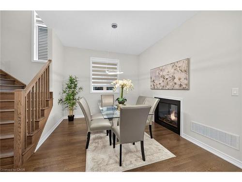 67 Starfire Crescent, Stoney Creek, ON - Indoor Photo Showing Dining Room With Fireplace