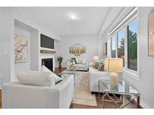 67 Starfire Crescent, Stoney Creek, ON - Indoor Photo Showing Living Room With Fireplace