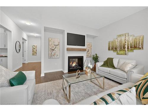 67 Starfire Crescent, Stoney Creek, ON - Indoor Photo Showing Living Room With Fireplace