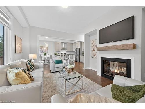 67 Starfire Crescent, Stoney Creek, ON - Indoor Photo Showing Living Room With Fireplace
