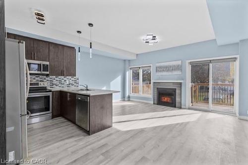 37 Delena Avenue S, Hamilton, ON - Indoor Photo Showing Kitchen With Fireplace