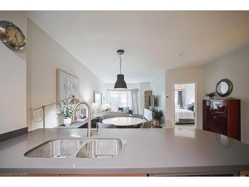 107-80 Port Street E, Mississauga, ON - Indoor Photo Showing Kitchen With Double Sink
