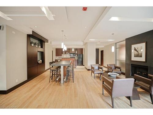 107-80 Port Street E, Mississauga, ON - Indoor With Fireplace