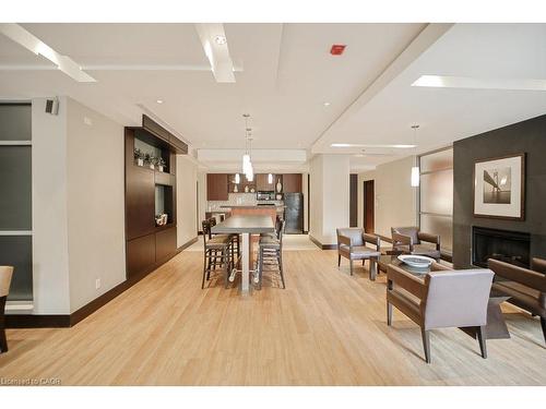 107-80 Port Street E, Mississauga, ON - Indoor With Fireplace