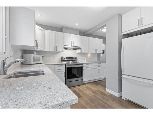 5119 Cherryhill Crescent, Burlington, ON - Indoor Photo Showing Kitchen With Double Sink
