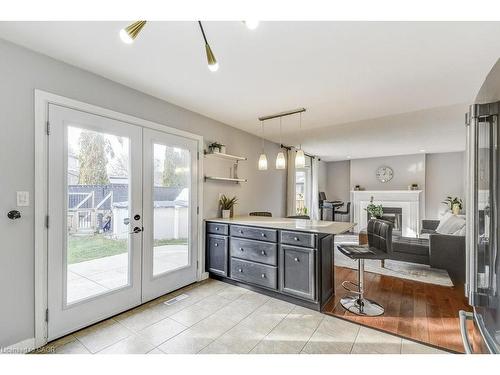 19 National Drive, Stoney Creek, ON - Indoor With Fireplace