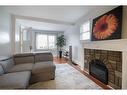 241 Vine Street, St. Catharines, ON  - Indoor Photo Showing Living Room With Fireplace 
