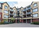 401-3070 Rotary Way, Burlington, ON  - Outdoor With Balcony With Facade 