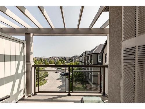 401-3070 Rotary Way, Burlington, ON - Outdoor With Balcony With Exterior