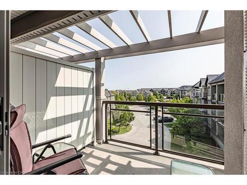 401-3070 Rotary Way, Burlington, ON - Outdoor With Balcony With Exterior